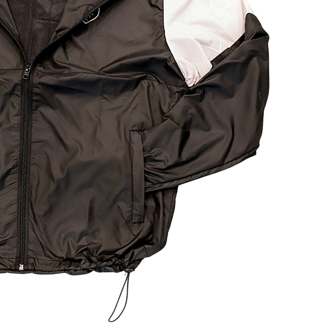 Stay warm and look good in our Angel City FC Unisex Black and Sol Rosa Full Zip Wind Jacket.  The lightweight jacket features a hood, pops of Sol Rosa on the shoulders, a Sol Rosa Angel City FC crest on the left chest, front pockets, mesh lining, and adjustable cinches on the hips.  Pairs well with our Unisex Tonal Joggers.